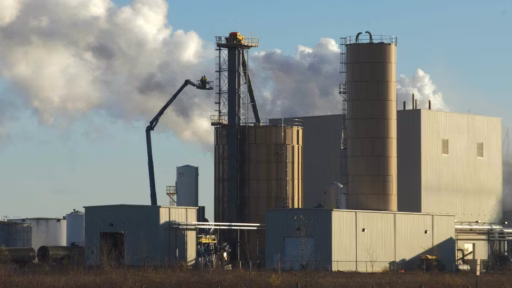 smoke blowing out of factory