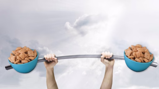 barbell with cereal bowls on either end