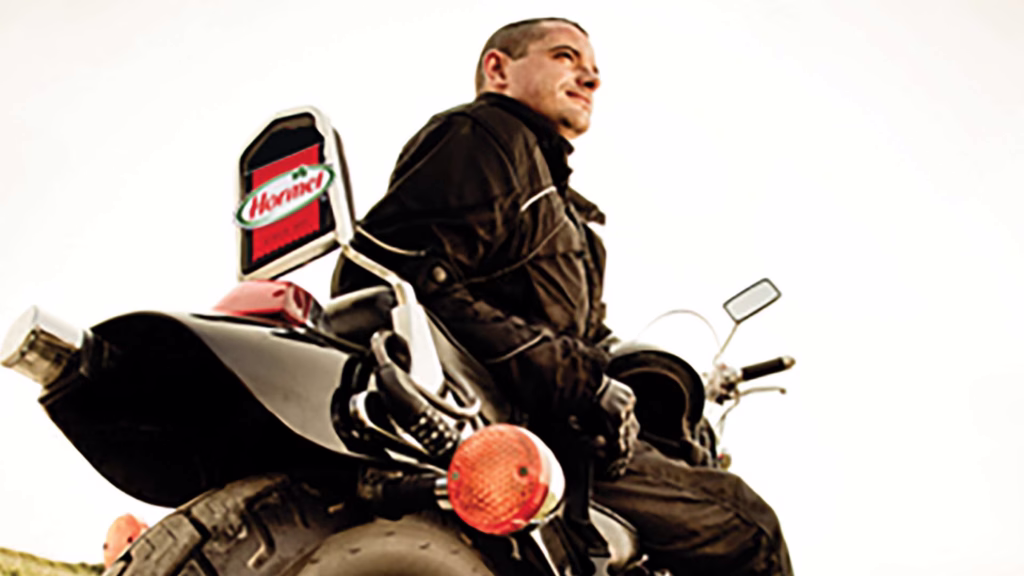 motorcycle with hormel sign on license plate