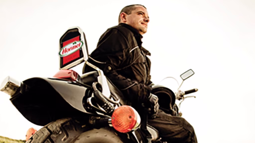 motorcycle with hormel sign on license plate