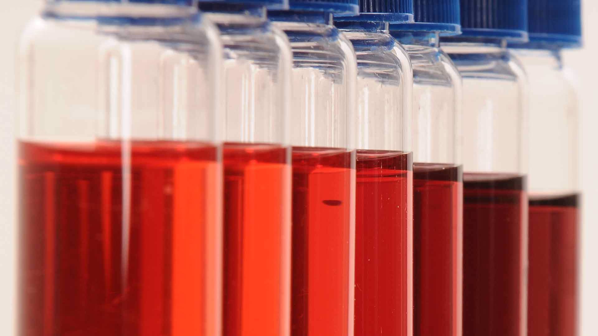vials containing red liquid