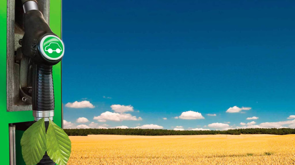 gas pump with yellow field in background