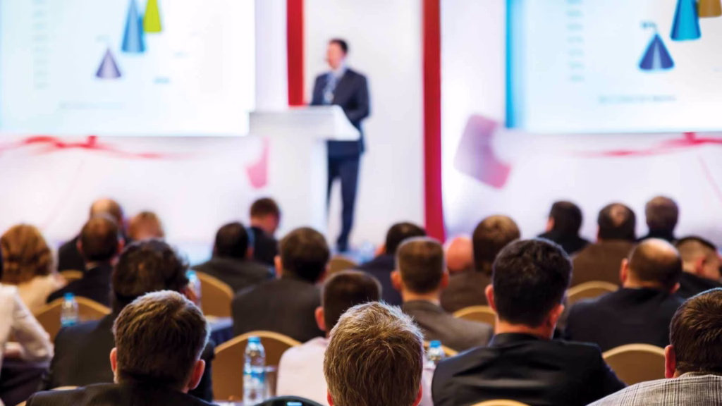 Out of focus meeting with podium