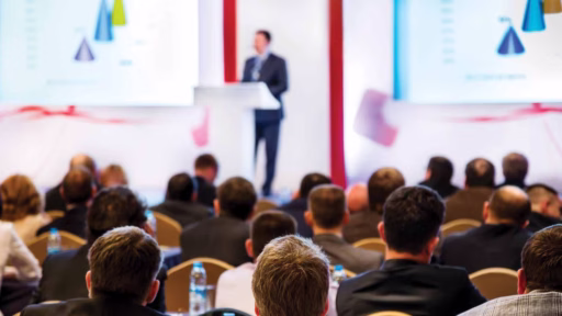 Out of focus meeting with podium