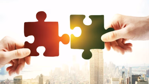 two puzzle pieces with city background