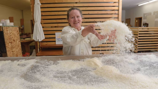 Woman throwing pure soap flakes in the air