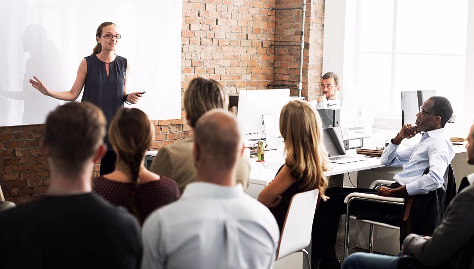 Photo of individuals in a strategy session